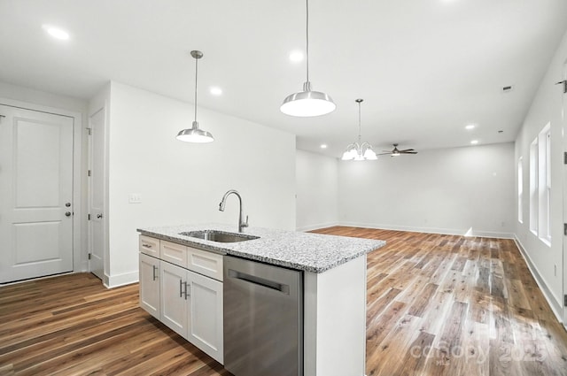 411 Patience Dr, Concord, NC 28025 - kitchen featuring stainless steel dishwasher, light wood-style flooring, pendant lighting, white cabinets, and recessed lighting