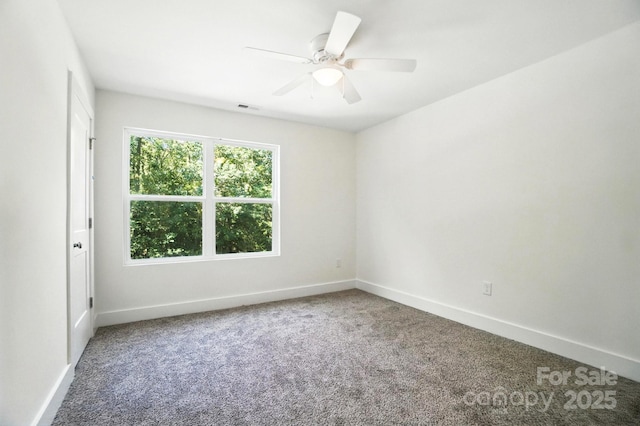 411 Patience Dr, Concord, NC 28025 - carpeted empty room with baseboards and ceiling fan