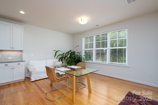 2407 Baxter Pl SE, Concord, NC 28025 - dining area featuring light wood-type flooring and recessed lighting
