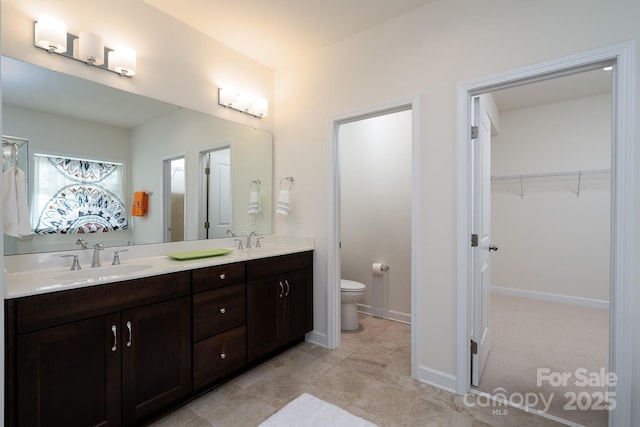 2407 Baxter Pl SE, Concord, NC 28025 - full bath with double vanity and a spacious closet