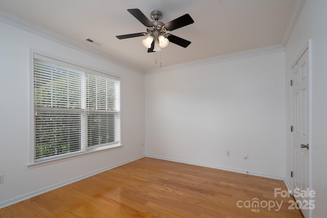 18730 Nautical Dr Unit 102, Cornelius, NC 28031 - unfurnished room with ornamental molding, light wood-style floors, and a ceiling fan