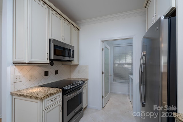 18730 Nautical Dr Unit 102, Cornelius, NC 28031 - kitchen featuring stainless steel appliances, ornamental molding, light tile patterned flooring, backsplash, and light stone countertops