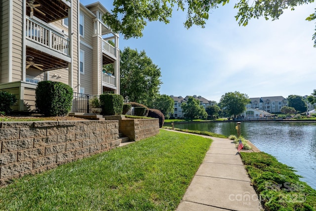 18730 Nautical Dr Unit 102, Cornelius, NC 28031 - view of grassy yard featuring a water view, a balcony, and a residential view