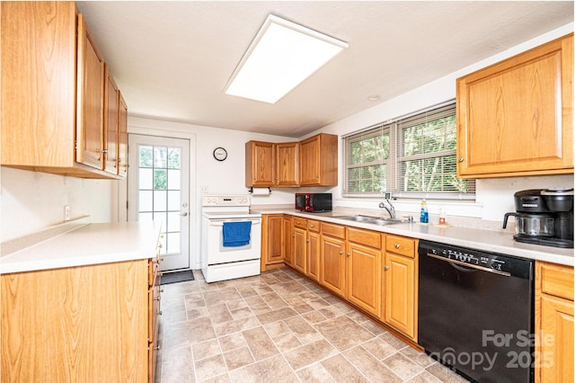 559 15th Ave SE, Hickory, NC 28602 - kitchen with black dishwasher, white range with electric cooktop, healthy amount of natural light, and light countertops