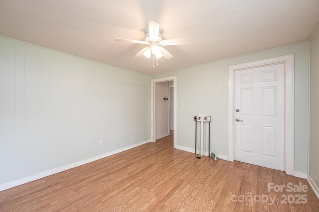 559 15th Ave SE, Hickory, NC 28602 - unfurnished room featuring light wood-type flooring and ceiling fan
