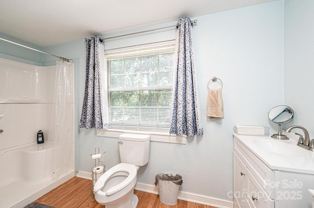559 15th Ave SE, Hickory, NC 28602 - full bathroom featuring wood finished floors, vanity, and a shower with curtain