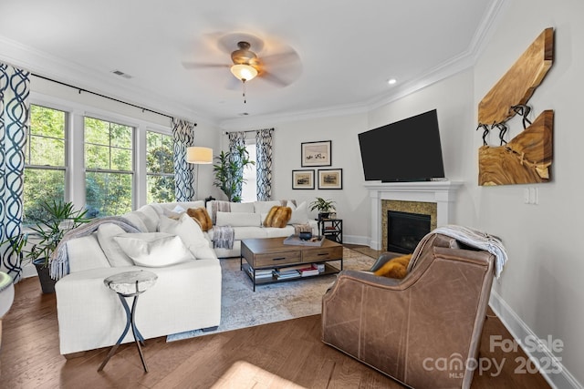 16522 Flintrock Falls Ln, Charlotte, NC 28278 - living area with crown molding, ceiling fan, a fireplace, and wood finished floors