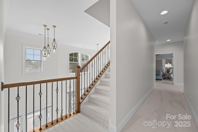 16522 Flintrock Falls Ln, Charlotte, NC 28278 - staircase with carpet floors, recessed lighting, ornamental molding, and a chandelier
