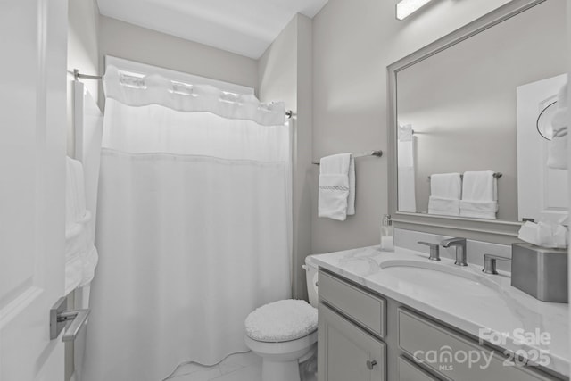 16522 Flintrock Falls Ln, Charlotte, NC 28278 - full bathroom featuring vanity, a shower with curtain, and marble look tile flooring