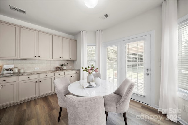 14801 Provence Ln, Charlotte, NC 28277 - dining area with healthy amount of natural light and wood finished floors