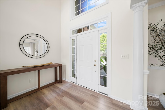 14801 Provence Ln, Charlotte, NC 28277 - foyer entrance with decorative columns and wood finished floors