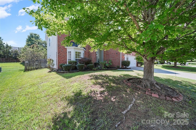 14801 Provence Ln, Charlotte, NC 28277 - obstructed view of property with brick siding and concrete driveway