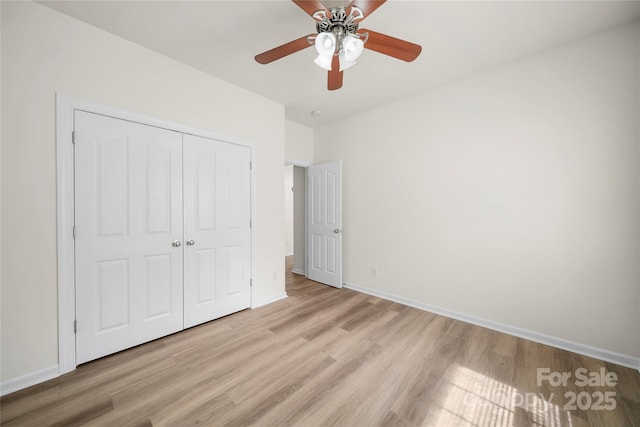 14801 Provence Ln, Charlotte, NC 28277 - unfurnished bedroom featuring light wood-type flooring, a closet, and ceiling fan