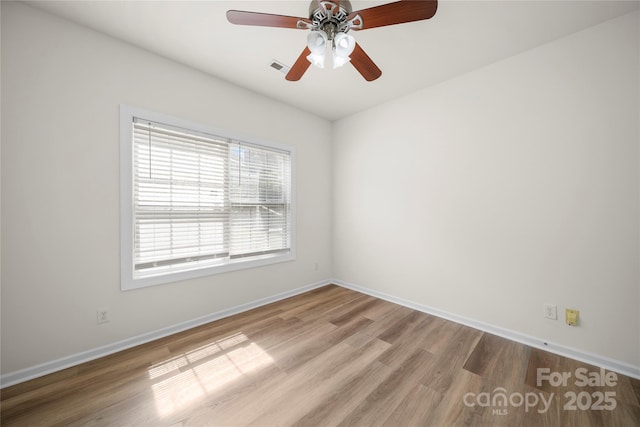 14801 Provence Ln, Charlotte, NC 28277 - spare room with wood finished floors and ceiling fan
