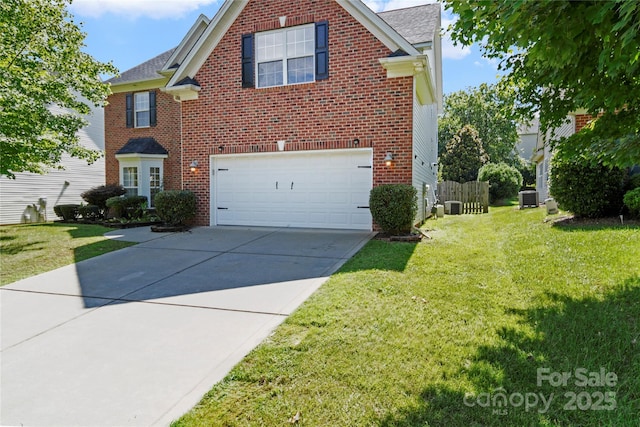 14801 Provence Ln, Charlotte, NC 28277 - view of front facade with an attached garage, driveway, a front yard, brick siding, and roof with shingles