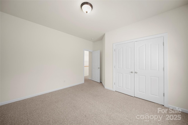 14801 Provence Ln, Charlotte, NC 28277 - unfurnished bedroom with light colored carpet and a closet