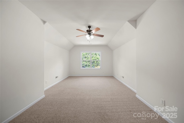 14801 Provence Ln, Charlotte, NC 28277 - bonus room featuring light colored carpet, lofted ceiling, and a ceiling fan
