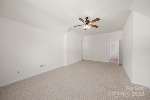 14801 Provence Ln, Charlotte, NC 28277 - additional living space with light colored carpet and a ceiling fan