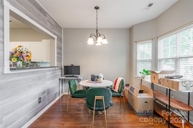 11521 Savannah Creek Dr, Charlotte, NC 28273 - dining space with a chandelier and wood finished floors