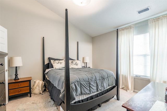 11521 Savannah Creek Dr, Charlotte, NC 28273 - bedroom with light carpet, vaulted ceiling, and multiple windows