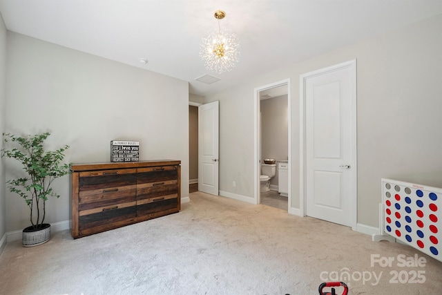 10437 Paper Birch Dr, Charlotte, NC 28215 - bedroom featuring carpet flooring, a chandelier, and ensuite bath