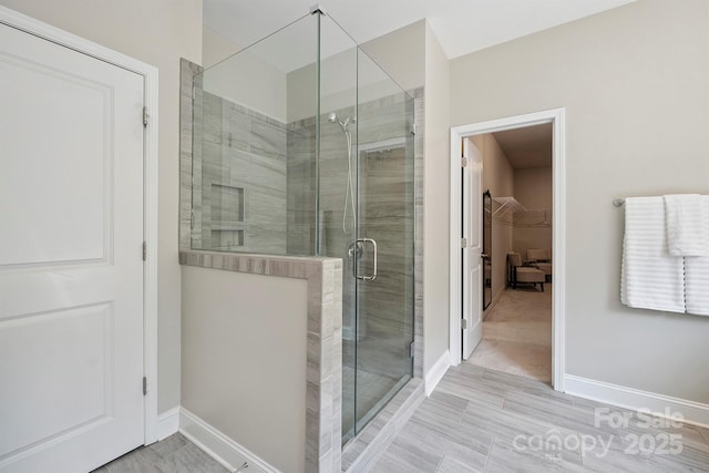 10437 Paper Birch Dr, Charlotte, NC 28215 - full bathroom featuring a walk in closet and a shower stall