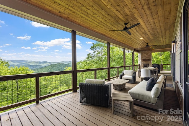 55 Steeplebush Ct Unit 629, Tuckasegee, NC 28783 - deck with a mountain view, an outdoor living space, and ceiling fan