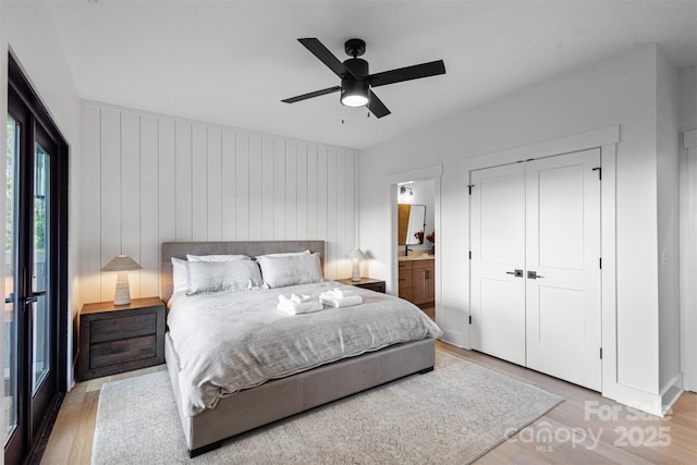55 Steeplebush Ct Unit 629, Tuckasegee, NC 28783 - bedroom featuring light wood finished floors, ensuite bathroom, a ceiling fan, and a closet