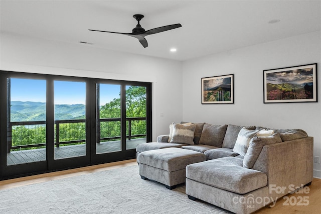 55 Steeplebush Ct Unit 629, Tuckasegee, NC 28783 - living room featuring light wood finished floors, a ceiling fan, recessed lighting, and a mountain view