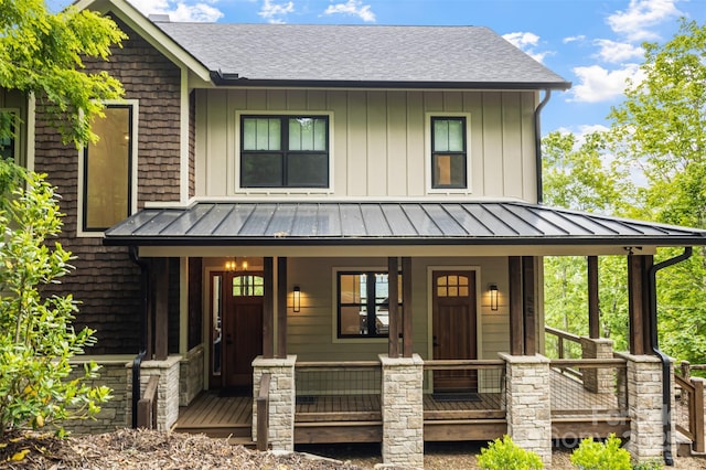 55 Steeplebush Ct Unit 629, Tuckasegee, NC 28783 - view of front of property with covered porch, a standing seam roof, a shingled roof, and board and batten siding