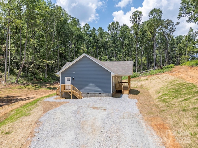 626 Felmet Rd, Flat Rock, NC 28731 - view of side of home with crawl space and gravel driveway