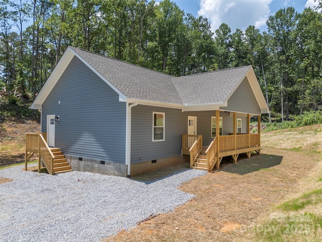 626 Felmet Rd, Flat Rock, NC 28731 - view of front of property featuring crawl space, a shingled roof, and covered porch