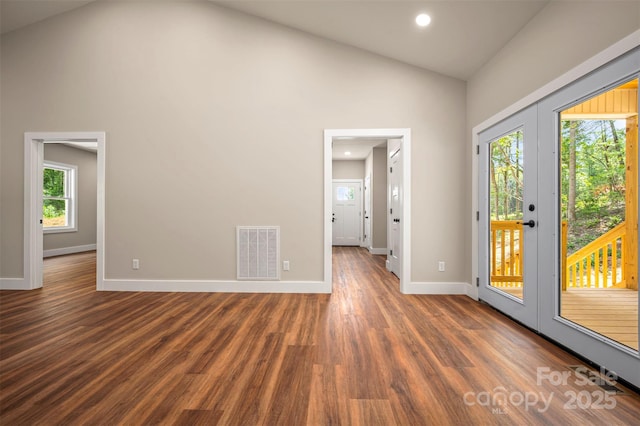 626 Felmet Rd, Flat Rock, NC 28731 - empty room featuring wood finished floors, high vaulted ceiling, and recessed lighting