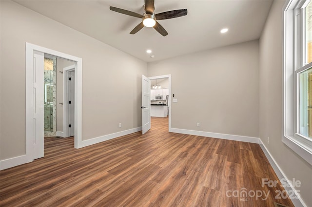 626 Felmet Rd, Flat Rock, NC 28731 - unfurnished bedroom featuring dark wood finished floors, recessed lighting, and a ceiling fan