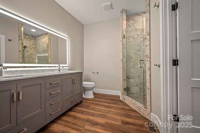 626 Felmet Rd, Flat Rock, NC 28731 - bathroom with a marble finish shower, double vanity, and wood finished floors