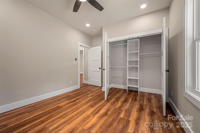 626 Felmet Rd, Flat Rock, NC 28731 - unfurnished bedroom with wood finished floors, a closet, recessed lighting, and ceiling fan