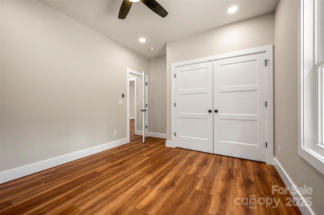 626 Felmet Rd, Flat Rock, NC 28731 - unfurnished bedroom with wood finished floors, recessed lighting, a ceiling fan, and a closet