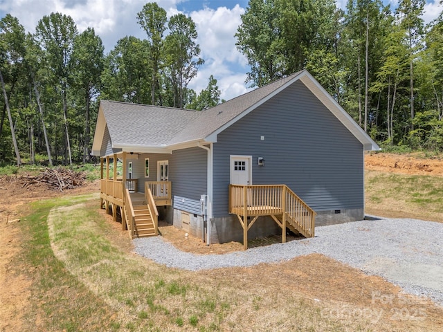626 Felmet Rd, Flat Rock, NC 28731 - rear view of property featuring crawl space, a shingled roof, stairway, and covered porch