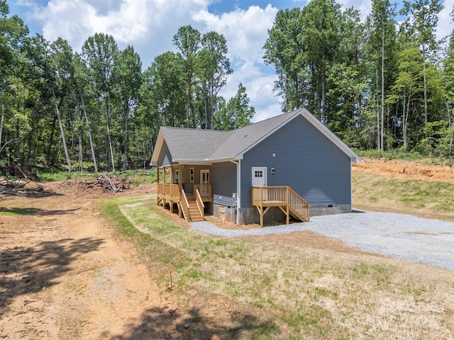 626 Felmet Rd, Flat Rock, NC 28731 - view of property exterior featuring crawl space, covered porch, and roof with shingles