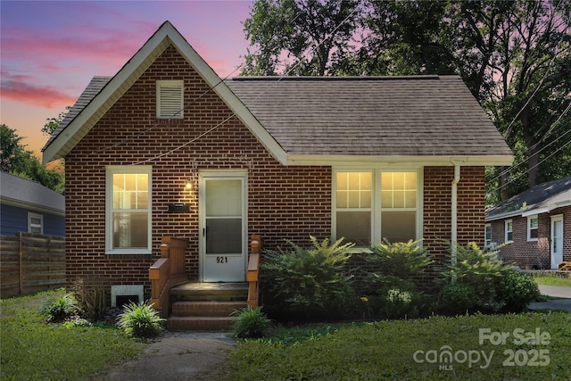 921 N Jackson St, Salisbury, NC 28144 - view of front of house with brick siding and a shingled roof
