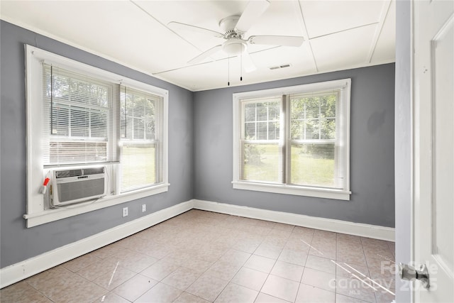 921 N Jackson St, Salisbury, NC 28144 - tiled empty room with healthy amount of natural light, cooling unit, and a ceiling fan