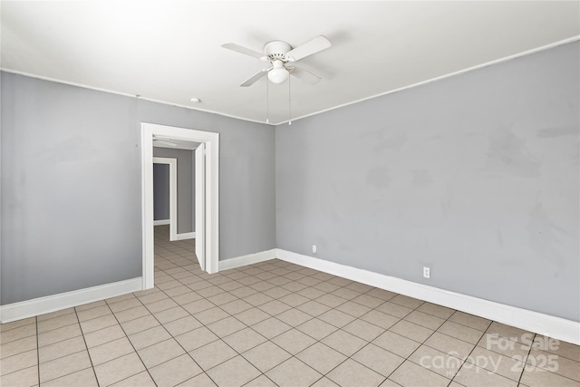 921 N Jackson St, Salisbury, NC 28144 - empty room with ceiling fan and light tile patterned floors