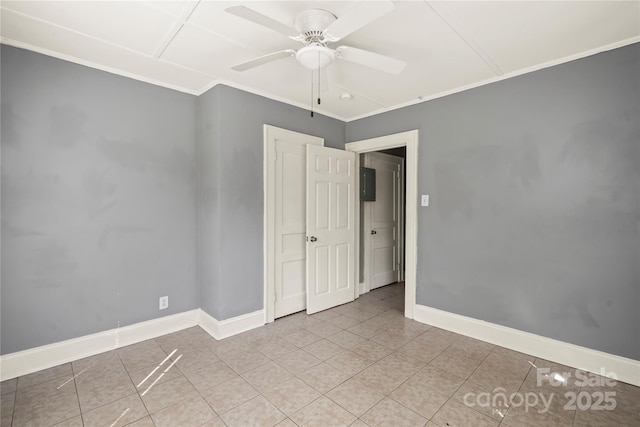 921 N Jackson St, Salisbury, NC 28144 - spare room with tile patterned floors, ornamental molding, and a ceiling fan