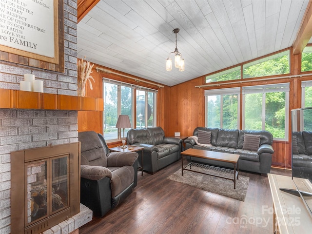 90 Hemlock Hill Hts, Canton, NC 28716 - living room with lofted ceiling, dark wood-style flooring, healthy amount of natural light, a fireplace, and wood walls