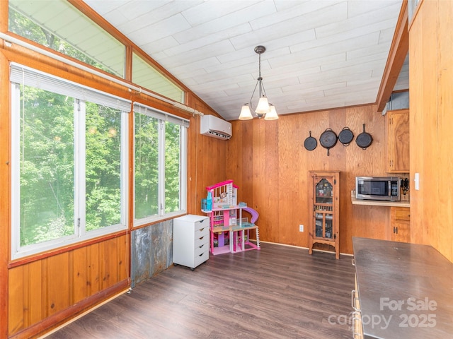 90 Hemlock Hill Hts, Canton, NC 28716 - game room featuring plenty of natural light, wood walls, a wall mounted AC, wood finished floors, and vaulted ceiling