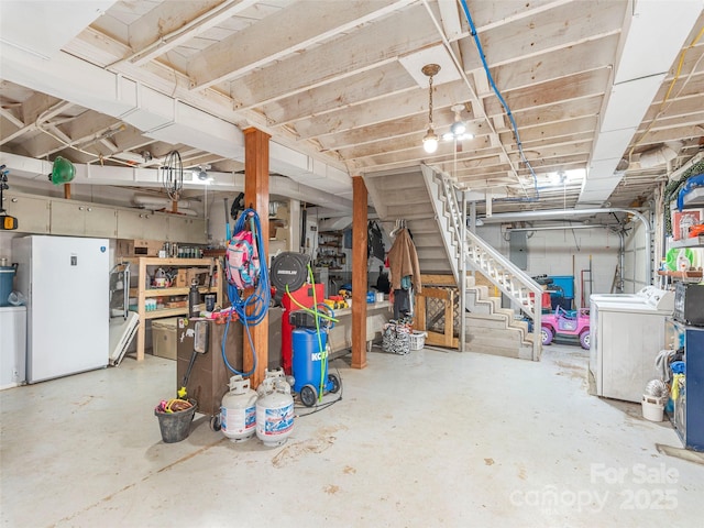 90 Hemlock Hill Hts, Canton, NC 28716 - unfinished basement featuring freestanding refrigerator, washer and dryer, and stairs