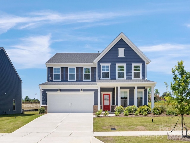 1516 Respect St NW, Concord, NC 28027 - view of front of home featuring concrete driveway, a front lawn, a garage, and covered porch