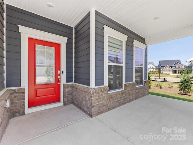 1516 Respect St NW, Concord, NC 28027 - view of exterior entry with a porch
