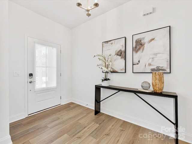 1516 Respect St NW, Concord, NC 28027 - entryway with light wood-style flooring and baseboards