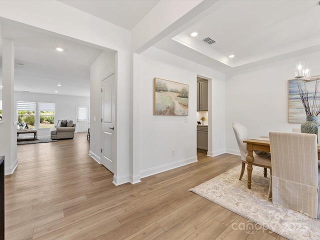 1516 Respect St NW, Concord, NC 28027 - dining area featuring light wood-type flooring, a chandelier, recessed lighting, and a raised ceiling